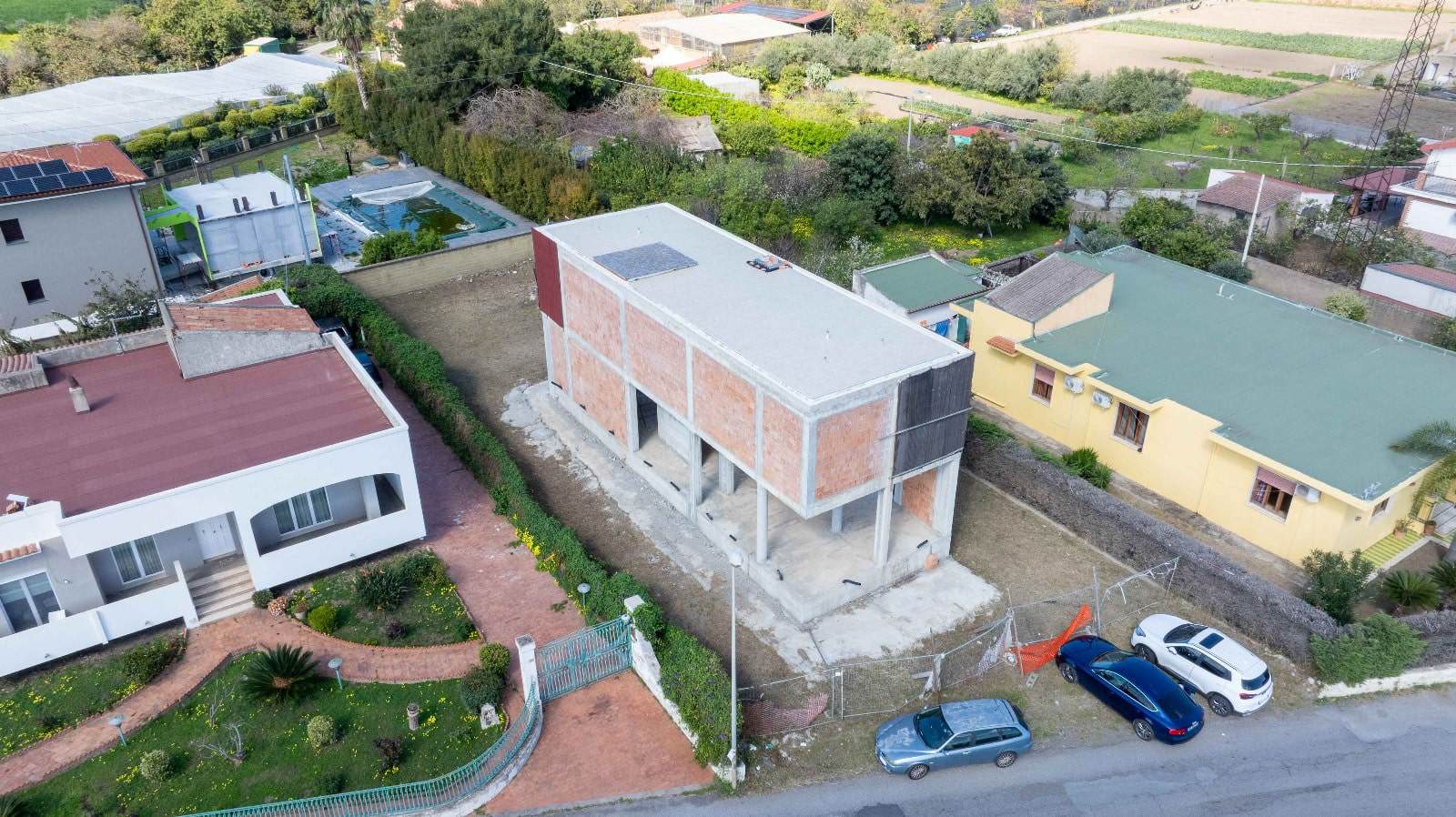 Edificio in costruzione residenziale a NextCasa, con struttura moderna e commercializzazione di immobili nuovi e di qualità.