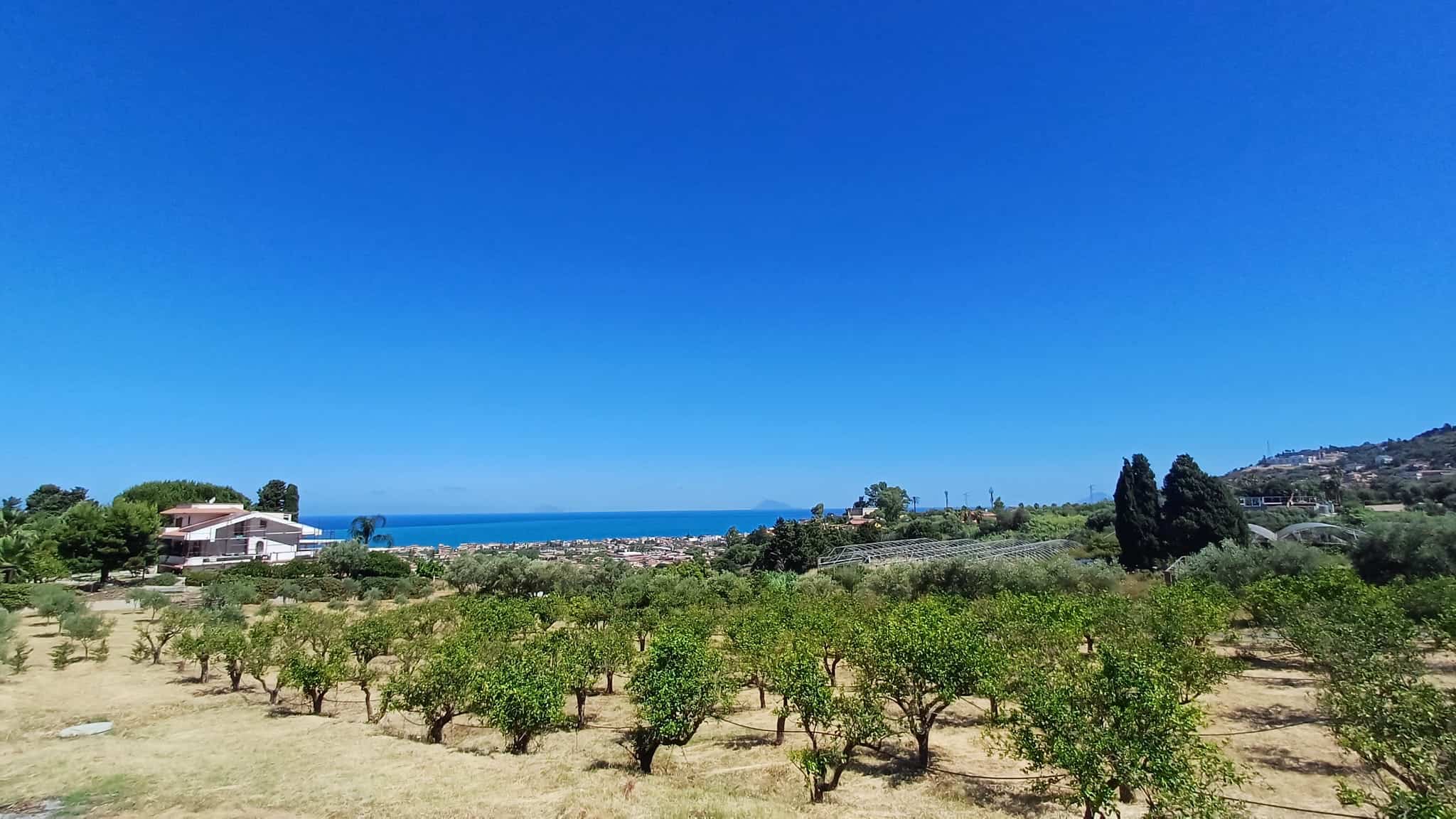 Terreno agricolo con vista mare a Capo d'Orlando, Sicilia, in vendita.