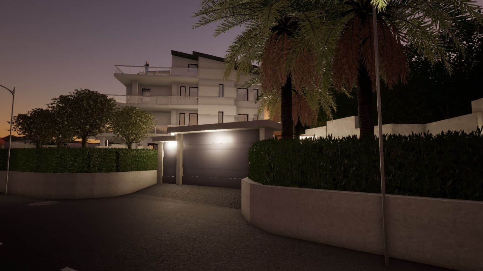 Immagine notturna di un complesso residenziale moderno con ingresso automatizzato e giardini curati a Capo D'Orlando, ME.